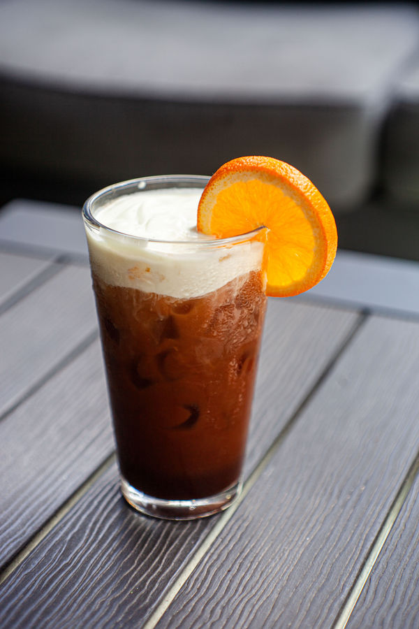 Iced botanical cola with orange
